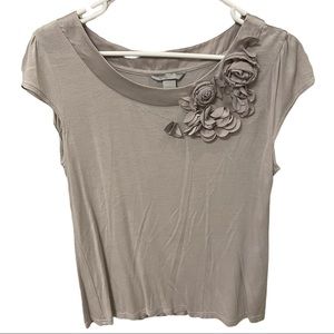 H&M short sleeve light tan/khaki top with sewn floral embellishment